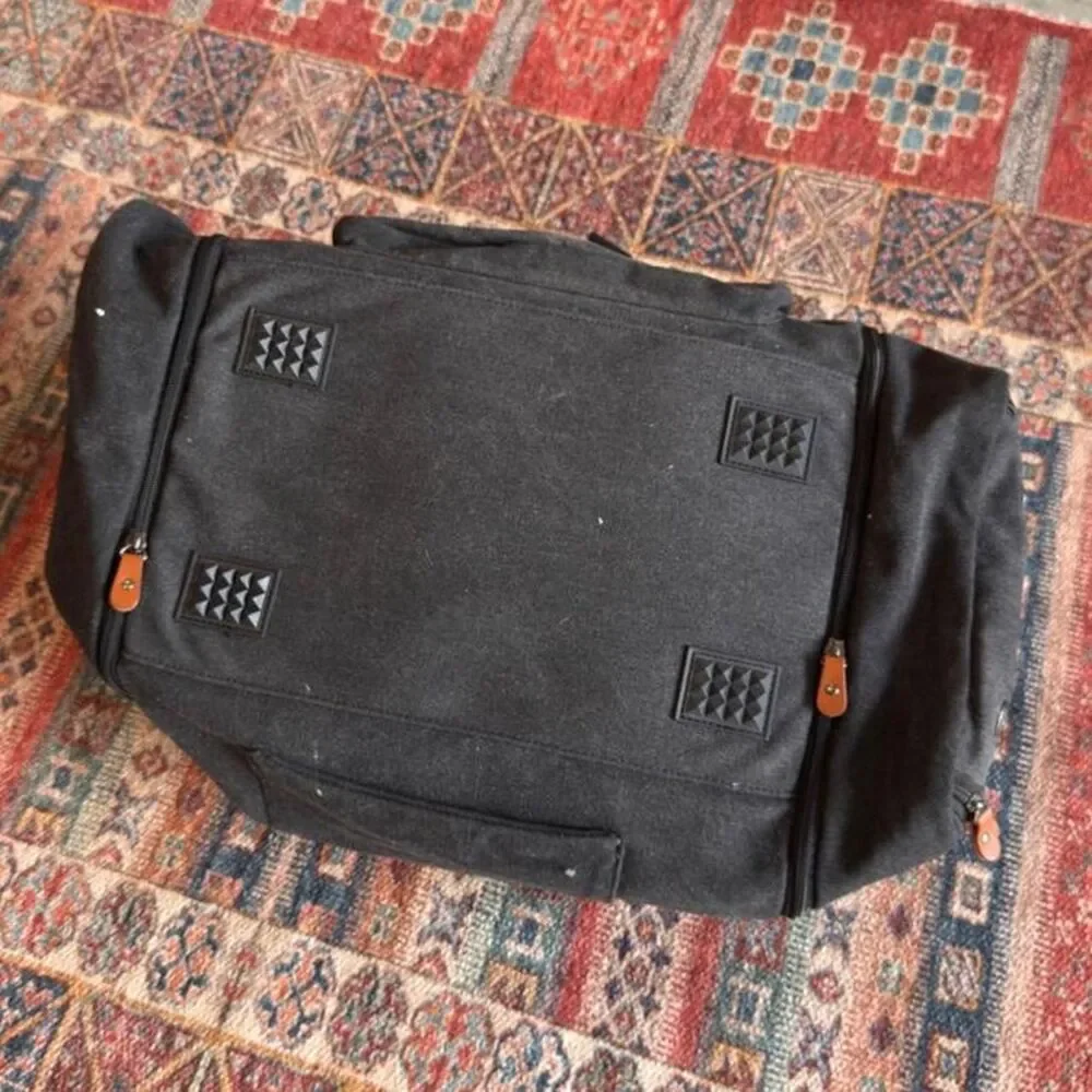 Sucipi Black canvas duffle bag with leather accents